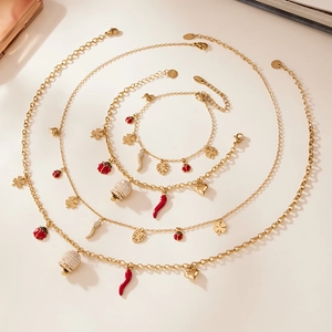 Parure de bijoux dorés avec pendentifs piment et coccinelle en acier inoxydable
