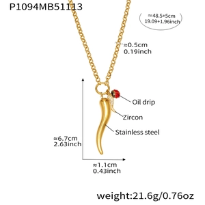 Detail of 18k gold plated corno pendant with zircon and ladybug on stainless steel chain