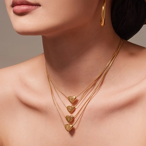 Layered gold heart necklace set with engraved LOVE letters and 18k gold plating