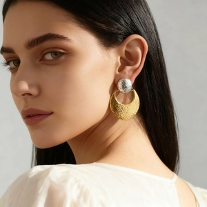 Two-tone stainless steel earrings with silver studs and golden hammered texture pendants