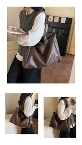 Detail of dark brown PU leather tote bag with long straps for office and college use