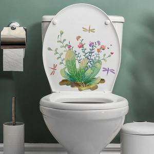 Macro detail of waterproof toilet seat decal with green plants and butterflies
