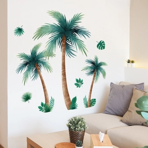 Detailed scene of tropical palm trees and monstera leaf wall stickers on a white wall