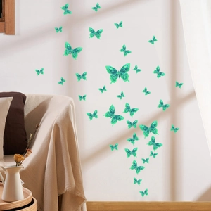 Detail of 3D luminous butterfly wall stickers with glowing glitter texture for home decor