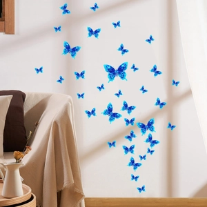 Luminous blue butterfly wall decals in various sizes decorating a modern living room
