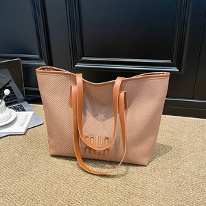 Chic woven brown tote bag with leather straps for women, perfect for daily commuting usage