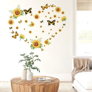 Detailed heart-shaped arrangement of sunflower and butterfly wall stickers on white wall