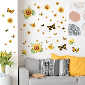 Vibrant sunflower and butterfly wall stickers applied on a white wall in a cozy living room