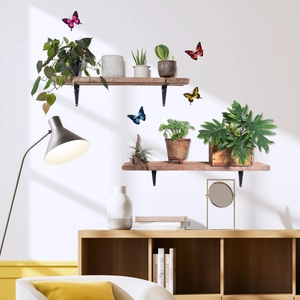 Detail view of 3D double-layered butterfly wall stickers in pink red yellow and blue