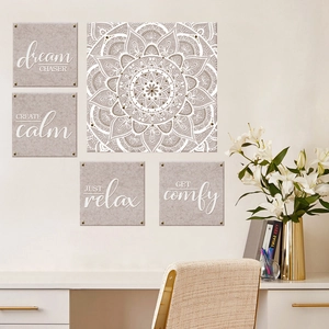 Close-up of bohemian yoga wall art set with mandala and inspirational dream chaser quotes