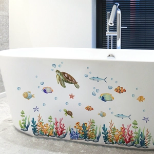 Self-adhesive ocean world sea turtle wall stickers on a white bathtub for bathroom decor