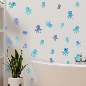 Cartoon octopus wall decals in blue tones for bathroom decor above a white bathtub