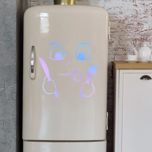 Detailed view of glow-in-the-dark emoji sticker on fridge with blue-purple gradient