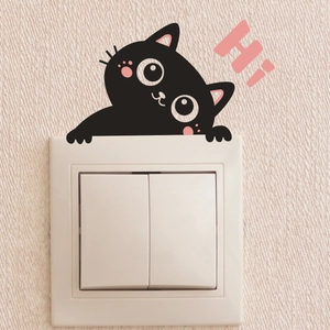 Cute black cat wall sticker peering over a light switch with pink Hi text decoration