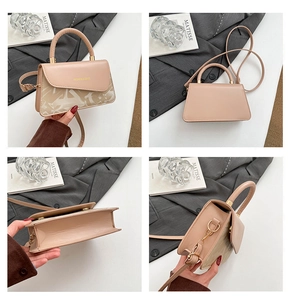 Gedetailleerde weergave van beige PU-leren handtas met stiksels en gouden accenten