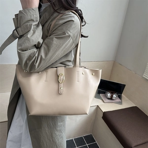 Classic apricot tote bag with gold metal buckle for women, stylish commuting shoulder bag