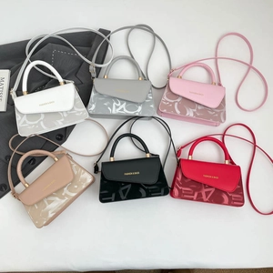 Mini crossbodytassen voor dames in zes kleuren met asymmetrische flap en handvat