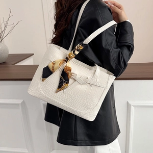 Minimalist white crocodile pattern tote bag with decorative silk scarf and long straps