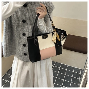 Detail of tricolor拼接 leather tote bag with printed silk scarf and fashion logo