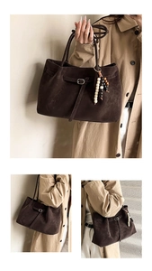 Detail of vintage suede tote bag with leather strap and decorative bead tassel charm