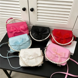 Mini pearl chain bags with elegant organza bows in multiple colors for stylish women