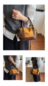 Détail du sac bowling en toile jaune et cuir marron avec boucle en métal bronze