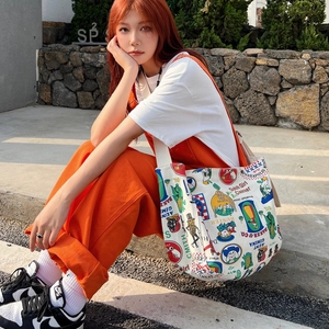 Retro canvas tote bag with colorful graffiti prints and wide shoulder straps