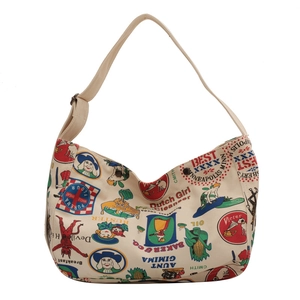 Retro canvas tote bag with colorful vintage graffiti print and adjustable strap