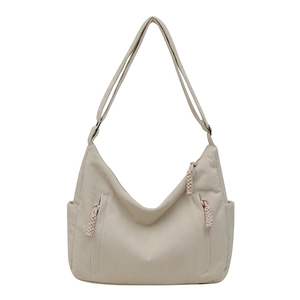 Beige Cord-Tasche mit gewebtem rosa Reißverschluss und verstellbarem Tragegurt