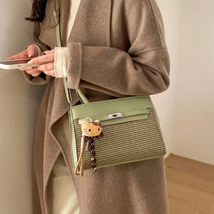 Fashionable green leather and woven crossbody bag with cute cat plush pendant charm