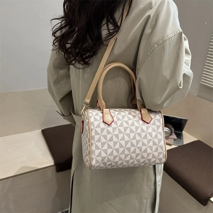 Chic beige geometric triangle pattern Boston bag with top handles and shoulder strap