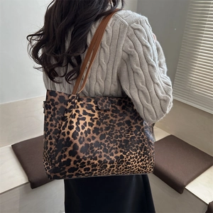 Large leopard print tote bag with brown leather straps for autumn winter fashion outfit
