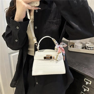White crocodile pattern Kelly bag with gold lock, pink silk scarf and shoulder strap