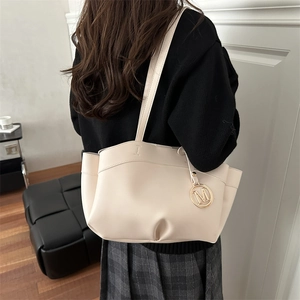 Retro cream white half-moon tote bag with gold M pendant and shoulder strap