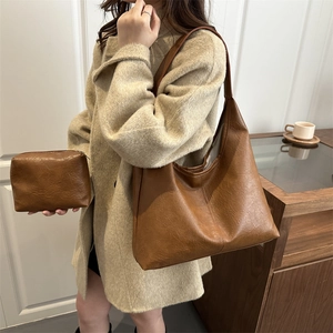 Brown vintage leather large tote bag set with matching pouch for stylish daily commuting