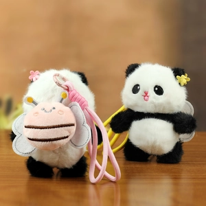 Detail of plush panda keychains with cute bee backpack and braided lanyard