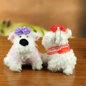 Front and back detail of plush Westie dog charms with lace collars and floral headbands