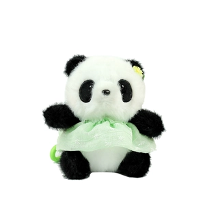 Simpatico portachiavi panda di peluche con vestito a fiori verde chiaro e fiore giallo