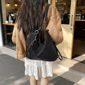 Black large capacity tote bag with detachable pouch and fashion lettering on back