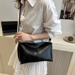 Minimalist black faux leather shoulder bag with large capacity for stylish daily wear