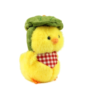 Cute yellow plush duckling with a green hat and red plaid scarf on a white background
