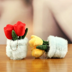 Close-up of plush tulip flower keychain pendants with soft velvet and corduroy textures