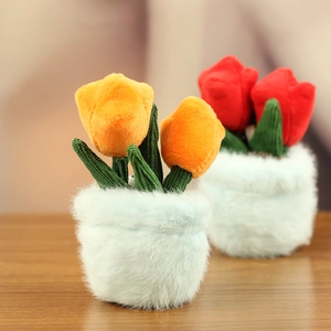 Detailed close-up of plush tulip potted ornaments with soft knitted stems and fabric flowers