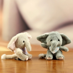 Detailed view of plush elephant keychains with soft textures and cute neckerchiefs