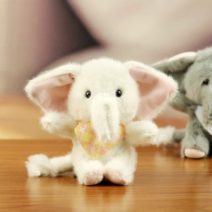 Close-up of white plush elephant keychain with pink ears and yellow plaid bowtie