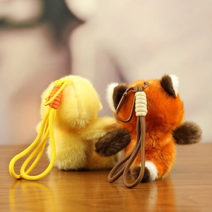 Detail of plush animal charms with braided paracord straps and matching carabiners