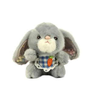 Cute gray plush bunny with blue checkered bib and carrot embroidery on white background