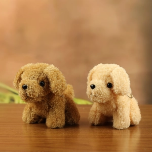 Macro detail of curly teddy dog plush toys in dark brown and light beige colors