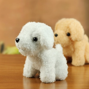 Close-up of curly lamb wool texture on white and brown teddy dog plush toys