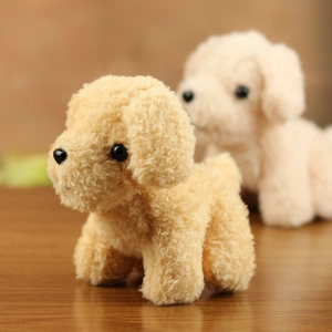 Macro shot of curly plush fabric and adorable facial details of a brown teddy dog toy